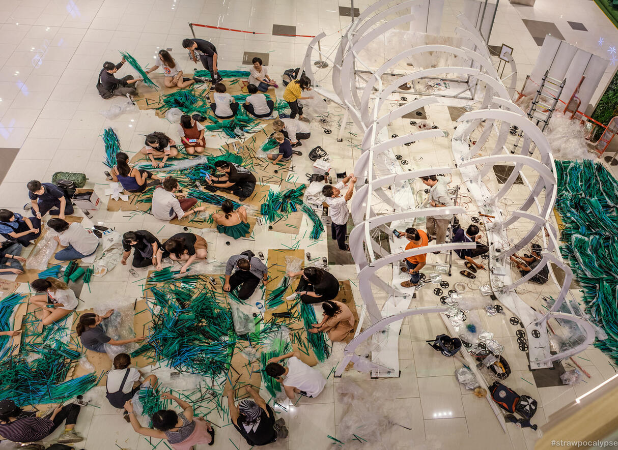 Building strawpocalypse installation in Vietnam with Volunteers